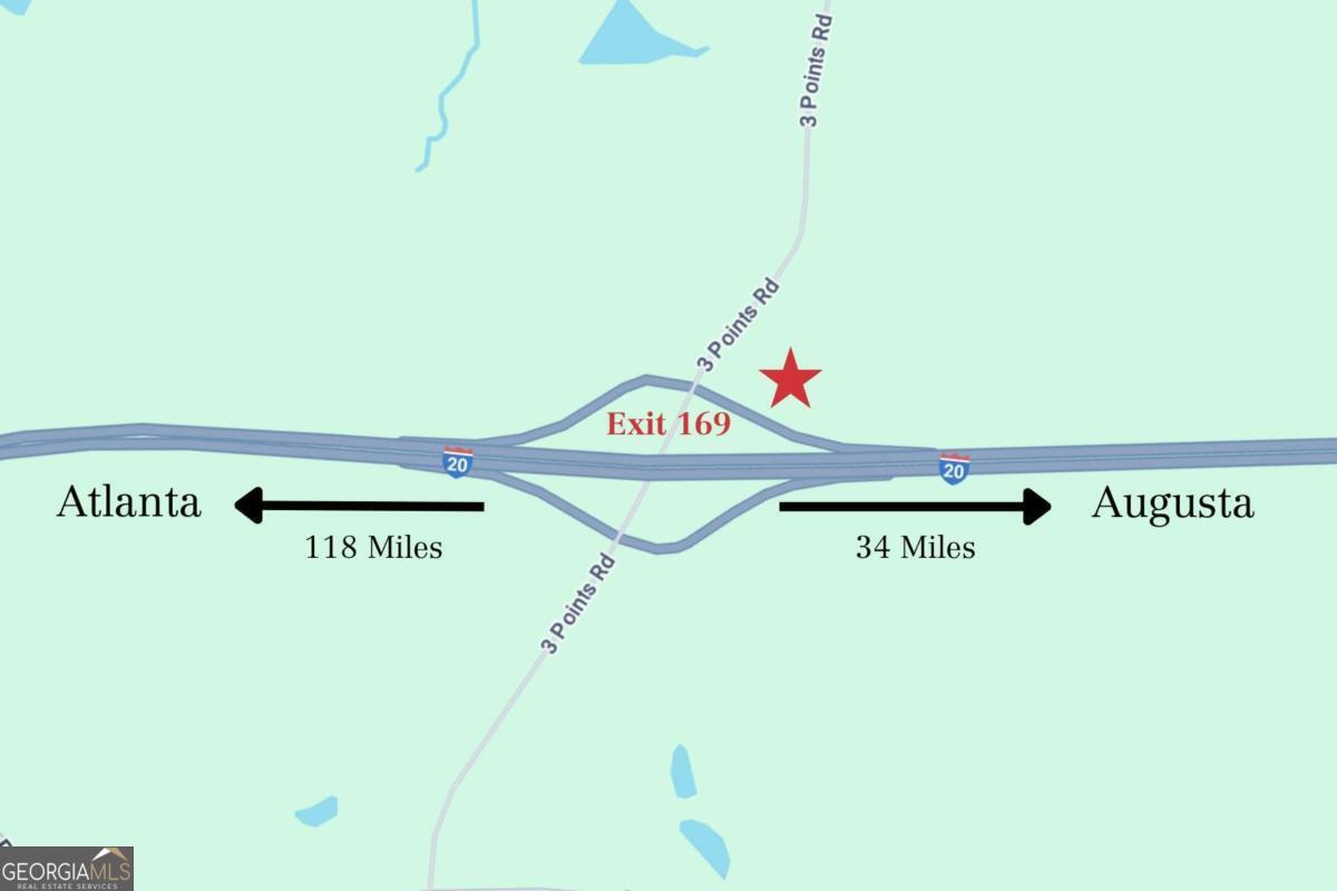 0 3 Points Road Thomson, GA 30824 - Photo 4 of 4 a close up of a sign on the wall