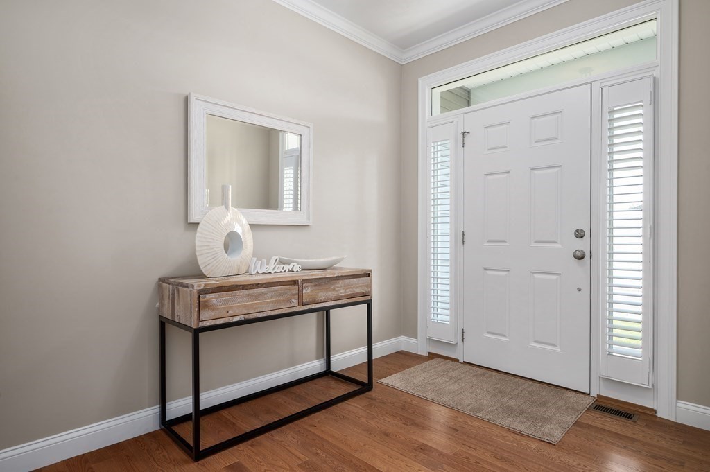 159 Rolling Rdg Drive, Unit 85 Northbridge, MA 01588 - Photo 2 of 25 a view of an entryway with wooden floor