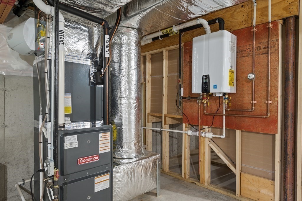 159 Rolling Rdg Drive, Unit 85 Northbridge, MA 01588 - Photo 22 of 25 front view of a house with a glass door