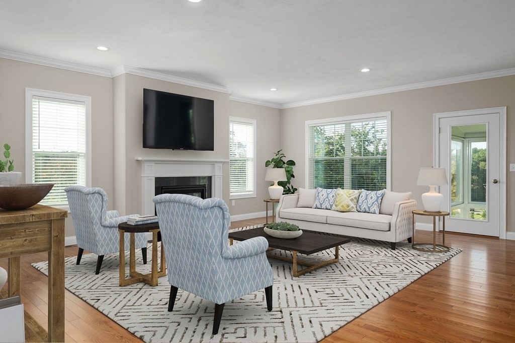 159 Rolling Rdg Drive, Unit 85 Northbridge, MA 01588 - Photo 4 of 25 a living room with furniture and a fireplace