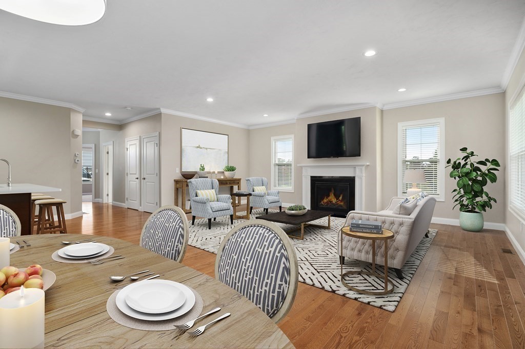 159 Rolling Rdg Drive, Unit 85 Northbridge, MA 01588 - Photo 5 of 25 a living room with furniture a flat screen tv and a fireplace