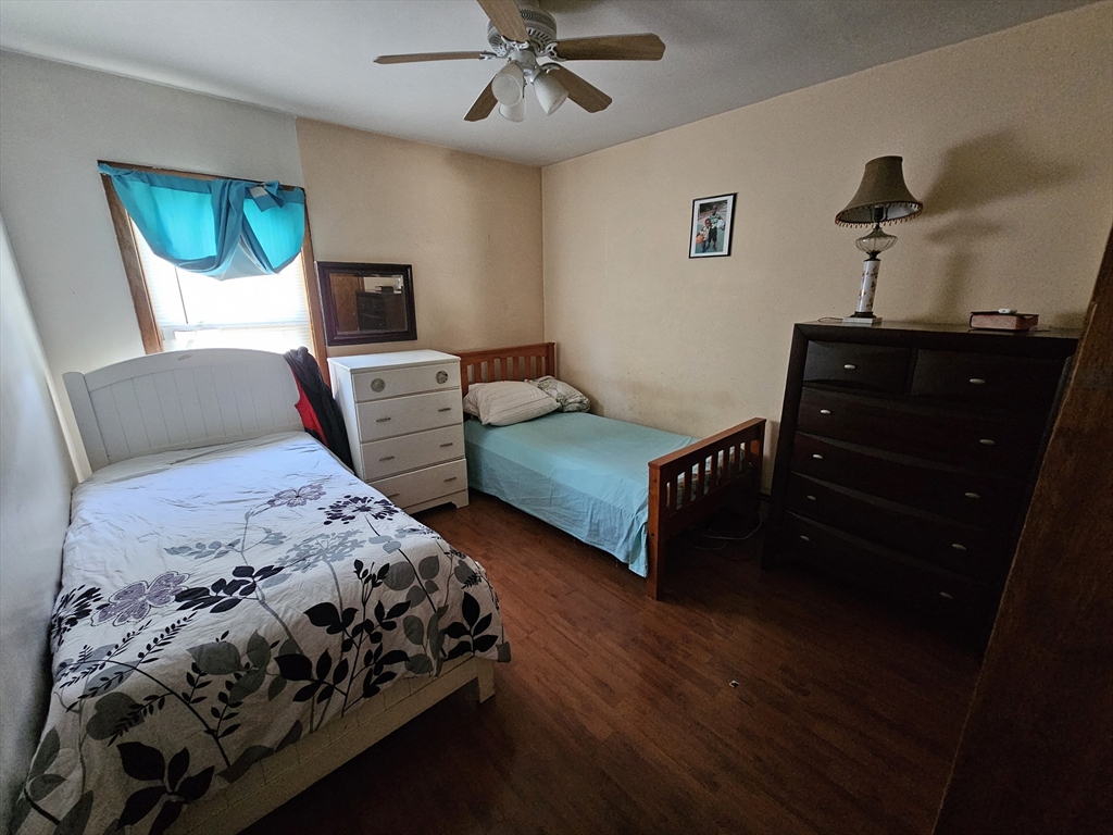 65 Beattie Street Fall River, MA 02723 - Photo 7 of 10 a bedroom with bed and a window