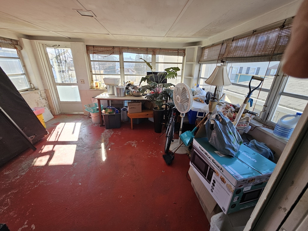 65 Beattie Street Fall River, MA 02723 - Photo 10 of 10 a living room with furniture and a large window