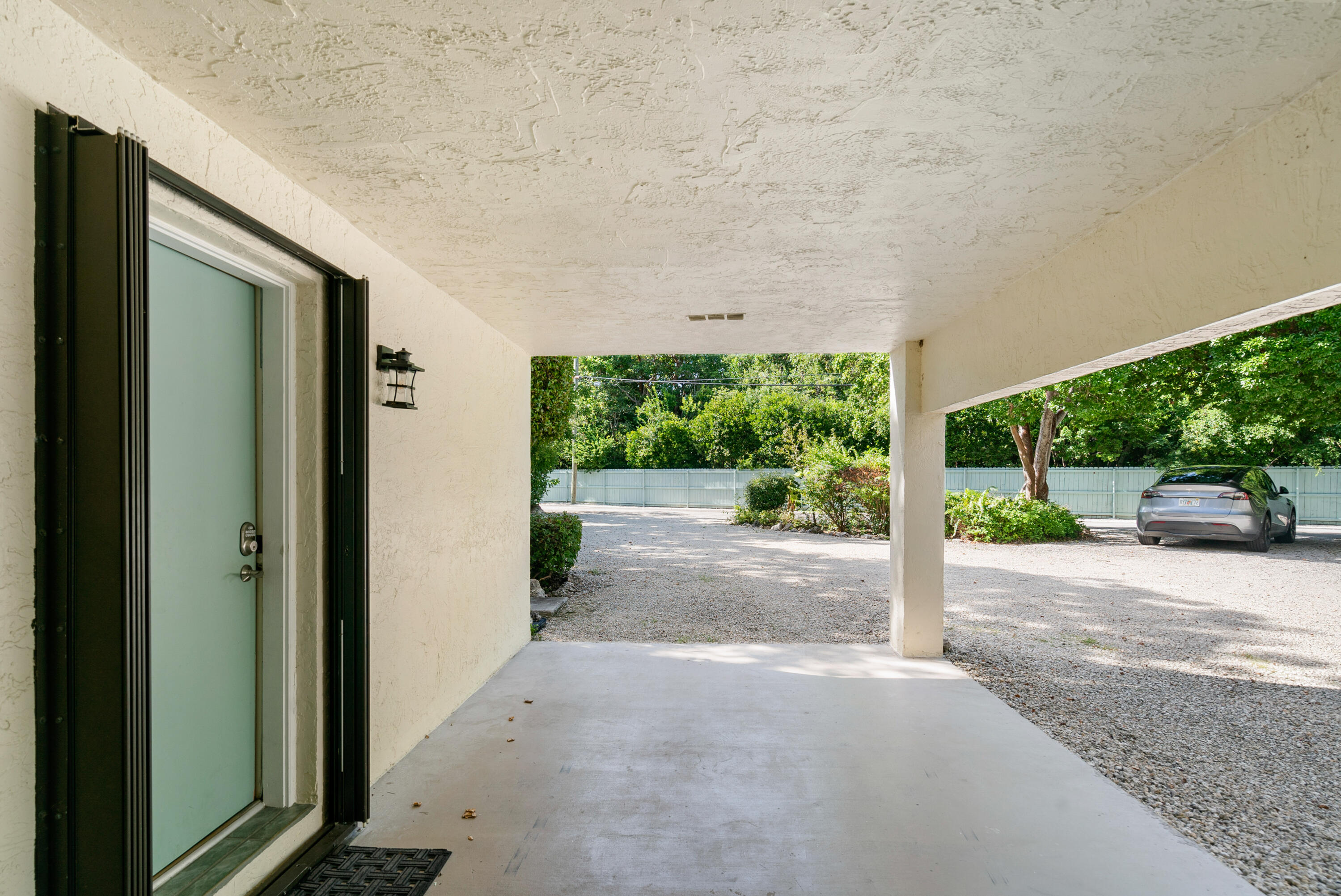 94220 Overseas Highway, Unit 5E Tavernier, FL 33037 - Photo 11 of 77 a view of a garden from a windows