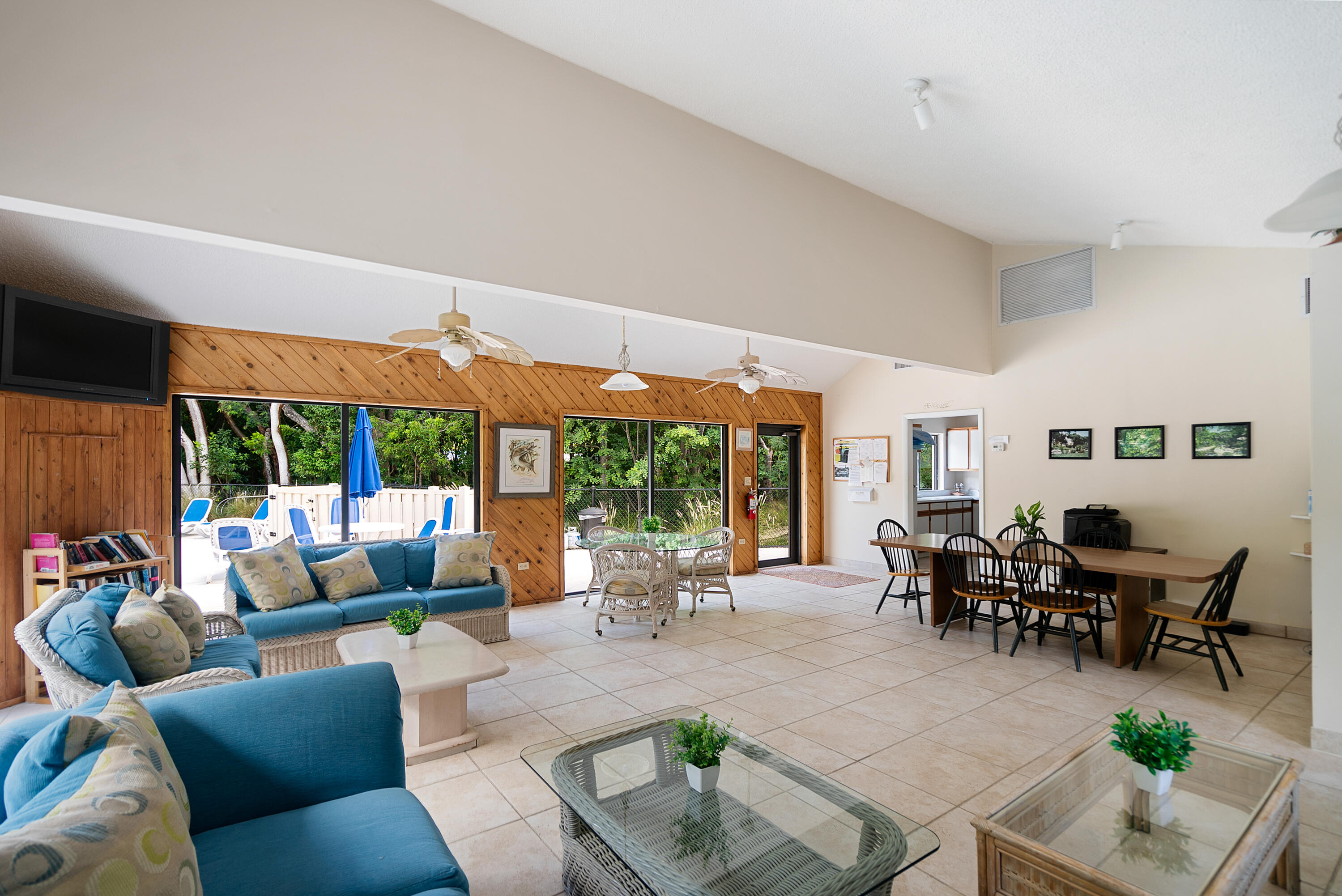 94220 Overseas Highway, Unit 5E Tavernier, FL 33037 - Photo 45 of 77 a living room with furniture and a large window