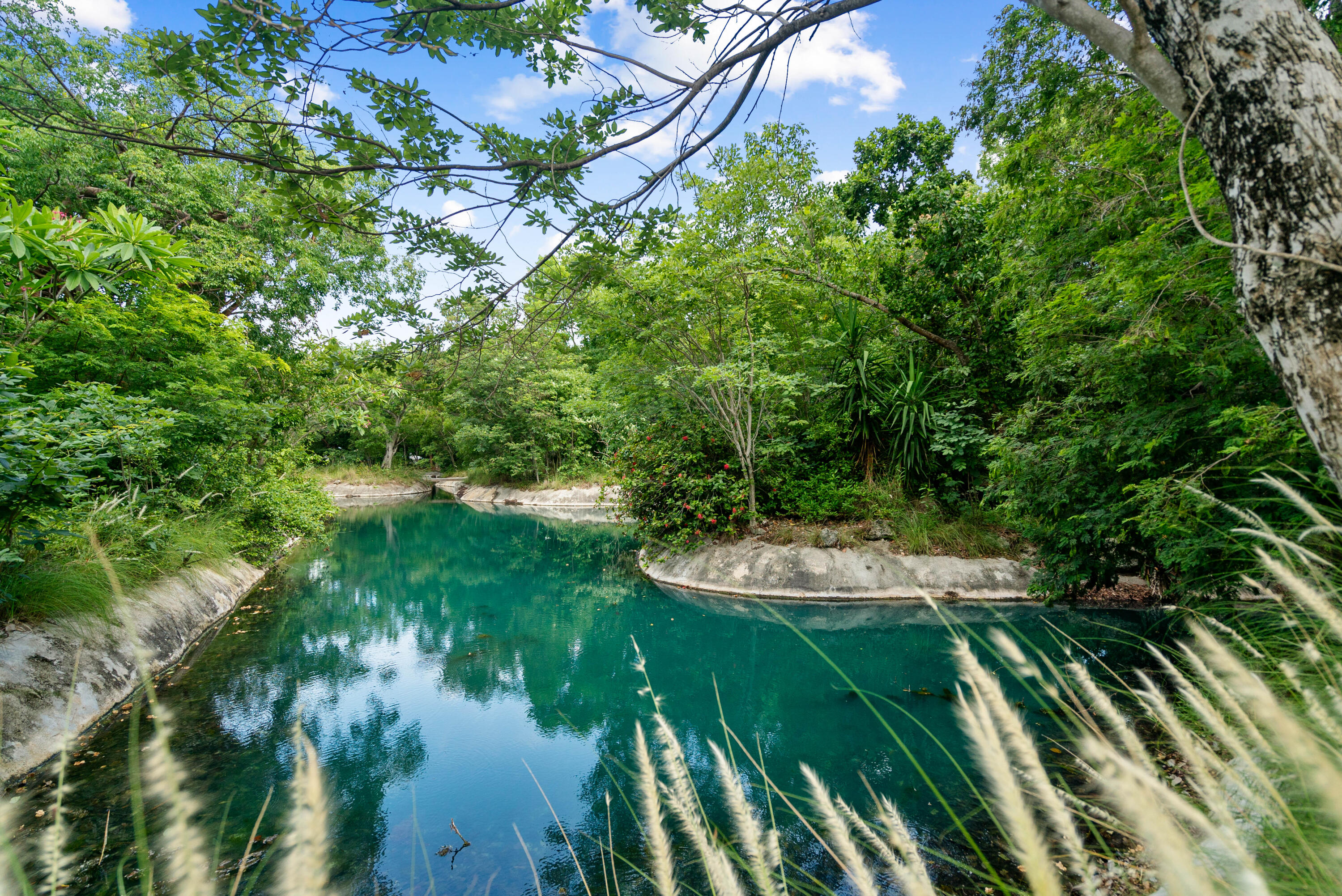 94220 Overseas Highway, Unit 5E Tavernier, FL 33037 - Photo 66 of 77 a view of a lake from a balcony