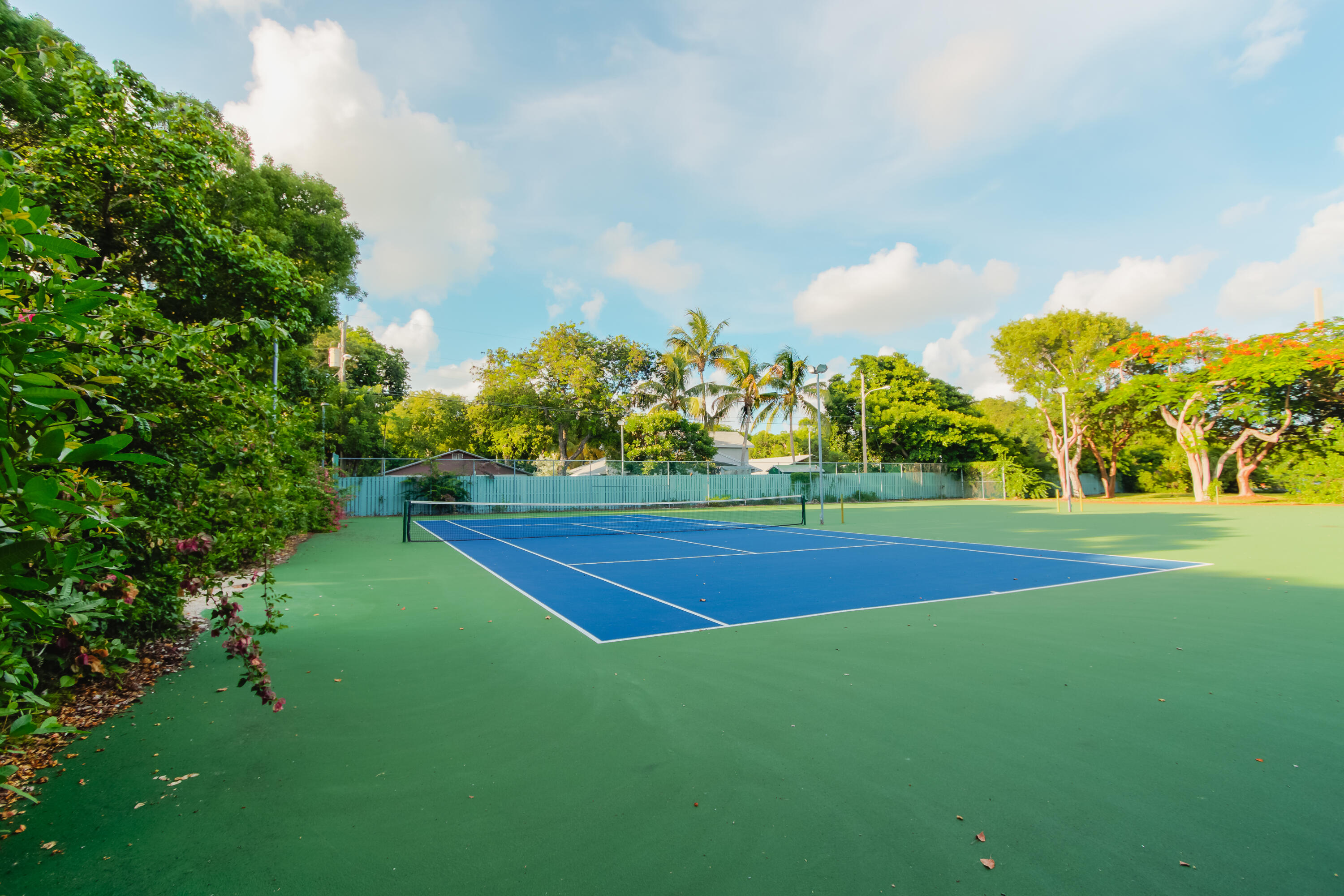 94220 Overseas Highway, Unit 5E Tavernier, FL 33037 - Photo 68 of 77 a yard with lots of green space and trees