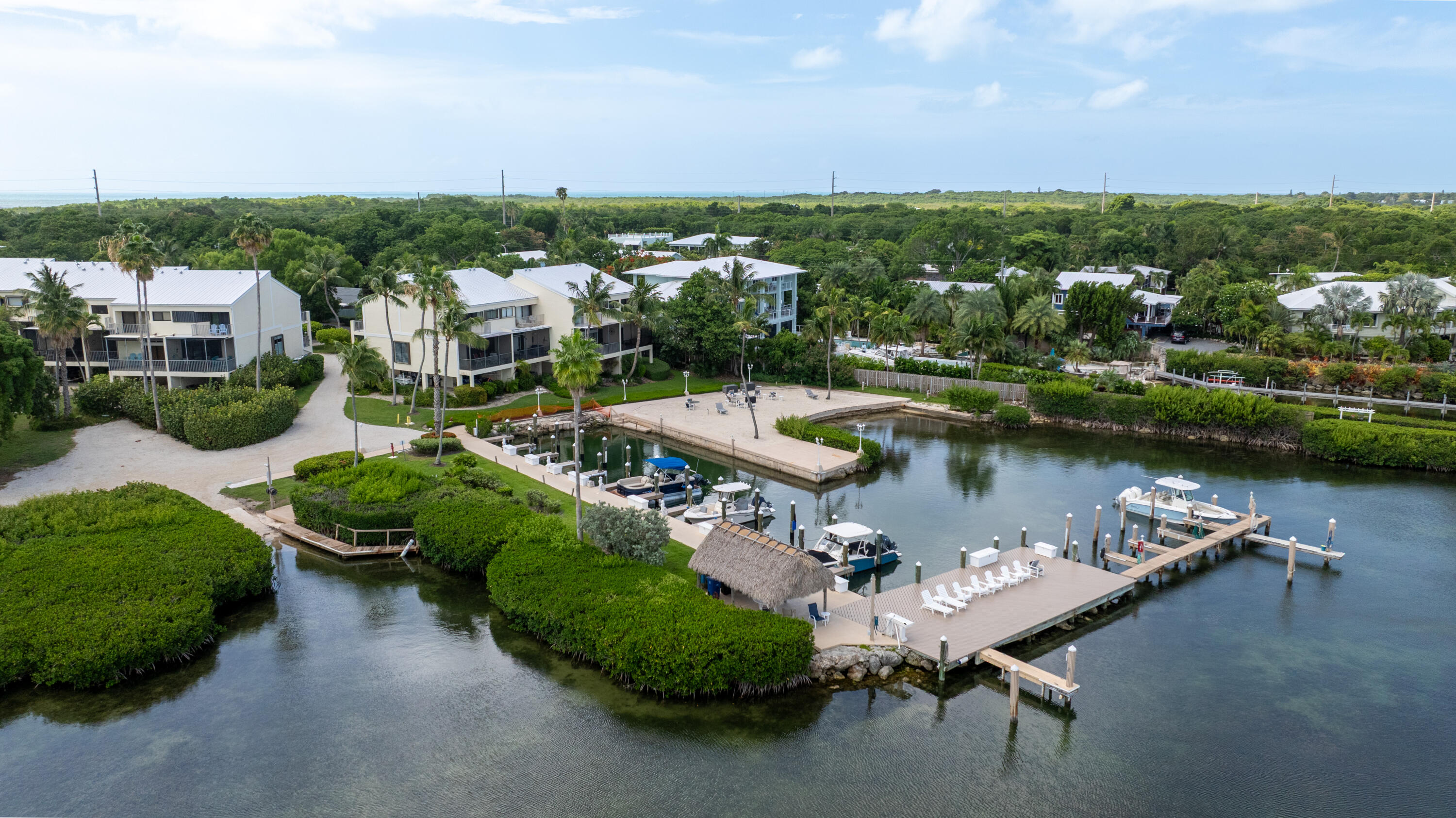 94220 Overseas Highway, Unit 5E Tavernier, FL 33037 - Photo 7 of 77 an aerial view of a house with a lake view