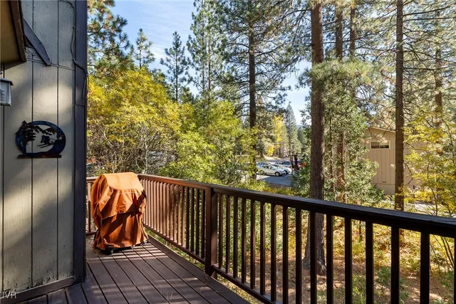 a view of balcony with wooden floor