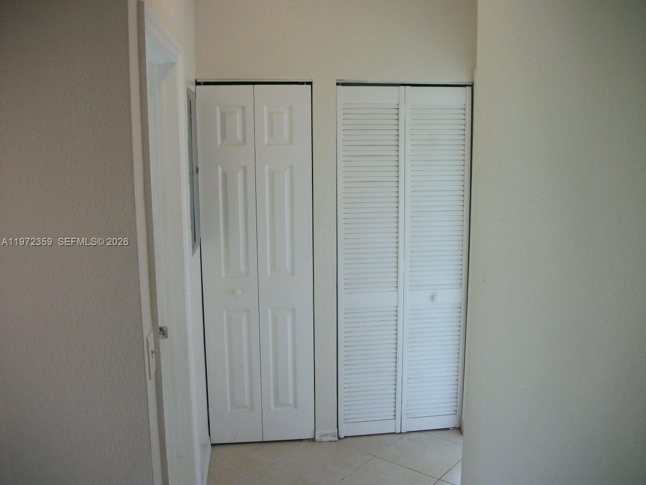 1596 Southwest 2nd Street Homestead, FL 33030 - Photo 22 of 42 a view of a closet