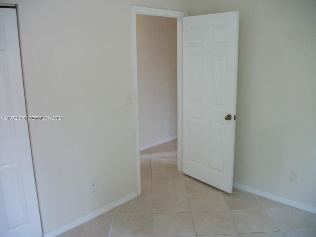 1596 Southwest 2nd Street Homestead, FL 33030 - Photo 26 of 42 a view of an empty room