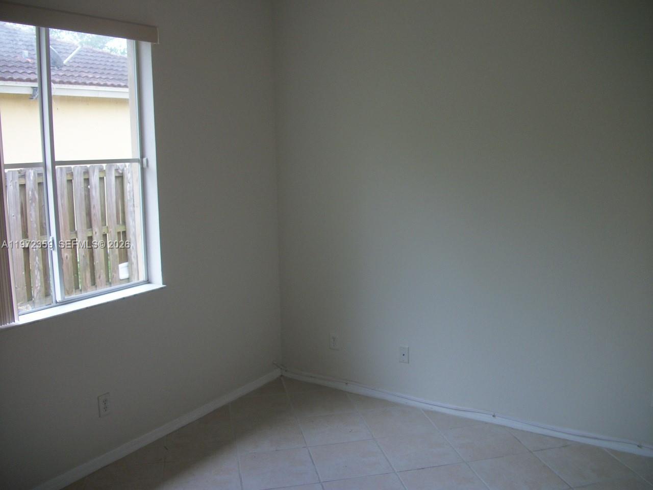 1596 Southwest 2nd Street Homestead, FL 33030 - Photo 27 of 42 a small space with a window