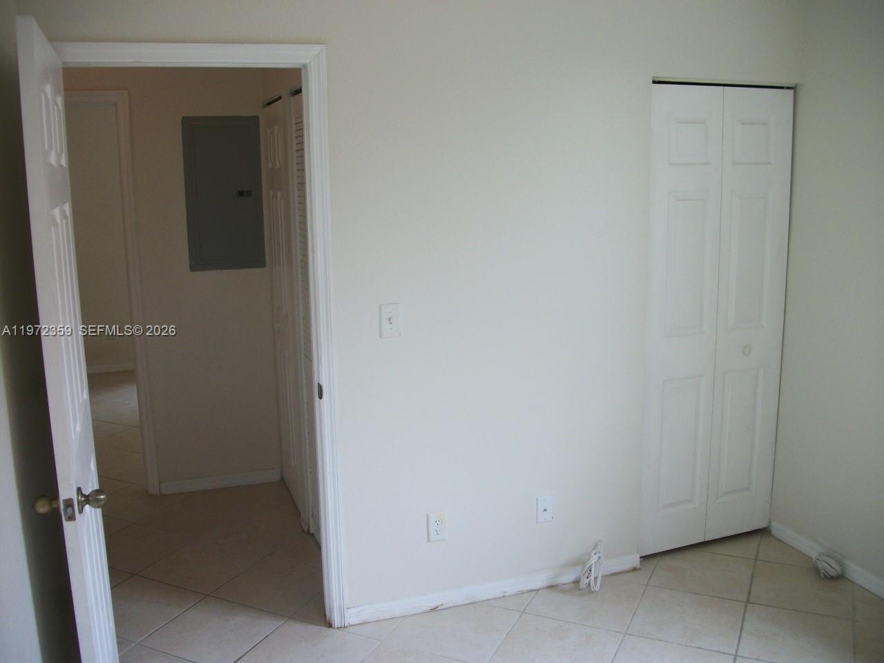 1596 Southwest 2nd Street Homestead, FL 33030 - Photo 28 of 42 a view of an empty room
