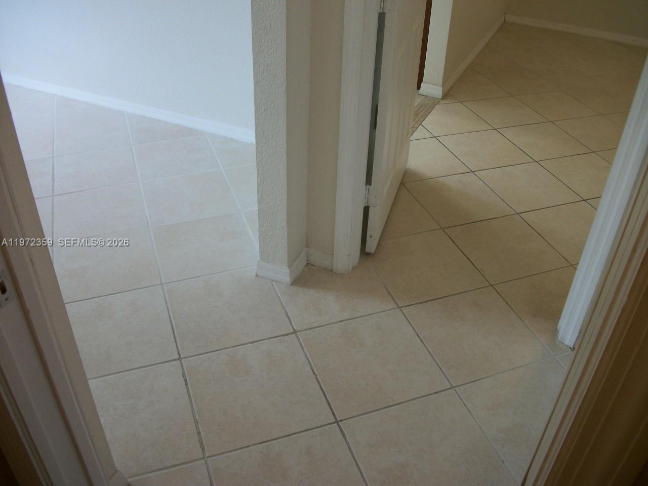 1596 Southwest 2nd Street Homestead, FL 33030 - Photo 36 of 42 a bathroom with a bathtub