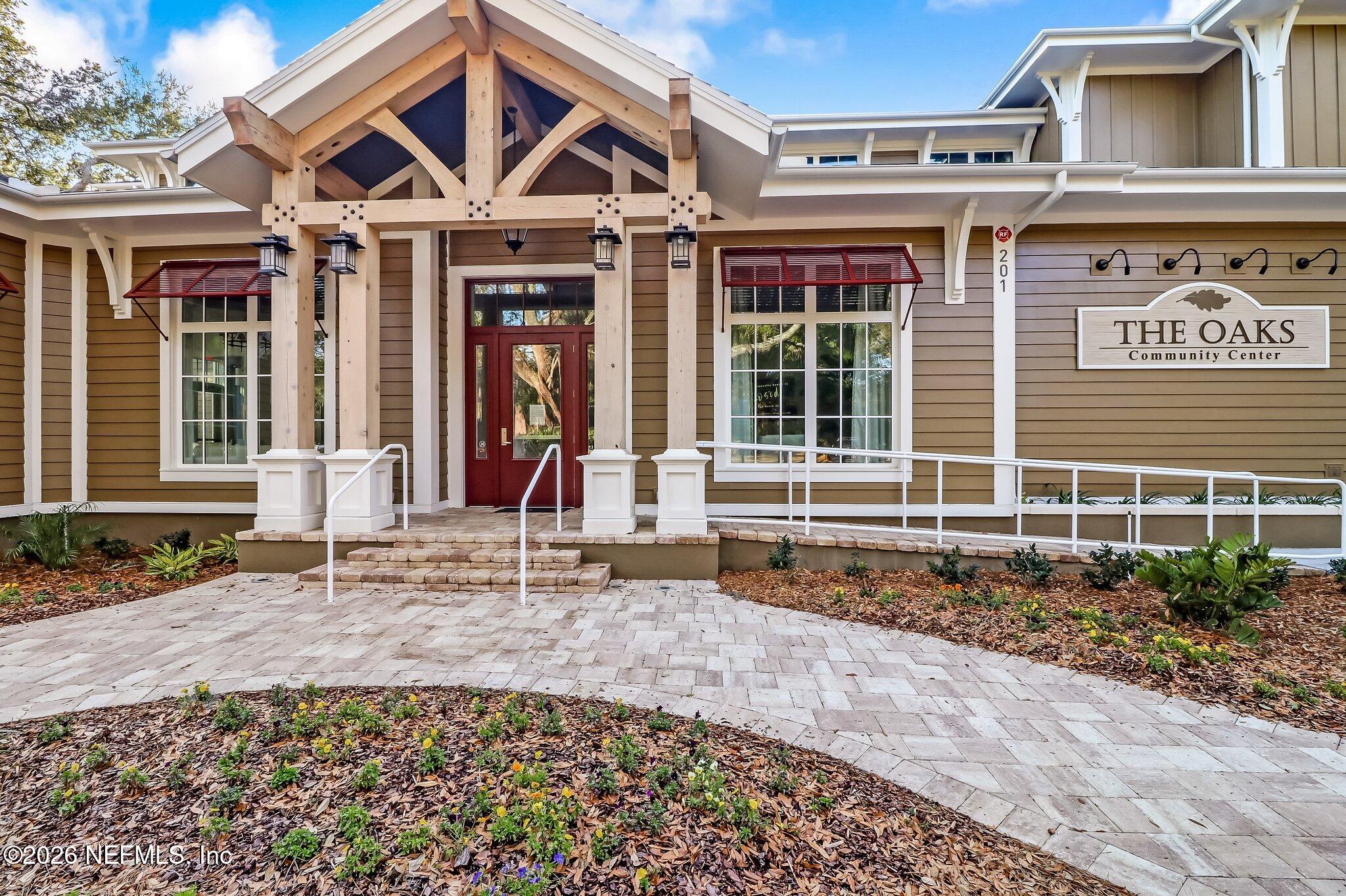 3327 Sea Marsh Road Fernandina Beach, FL 32034 - Photo 38 of 39 a front view of a house with garden