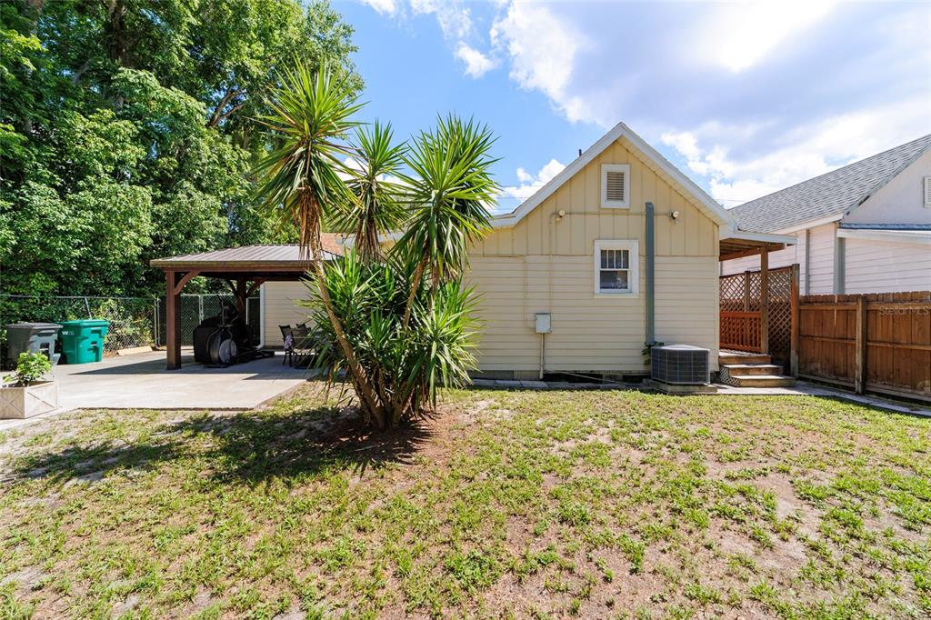 20693 Walnut Street Dunnellon, FL 34431 - Photo 13 of 51 a front view of a house with a yard and garage