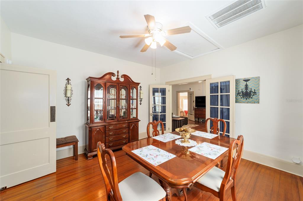 20693 Walnut Street Dunnellon, FL 34431 - Photo 26 of 51 a view of a dining room with furniture window and wooden floor
