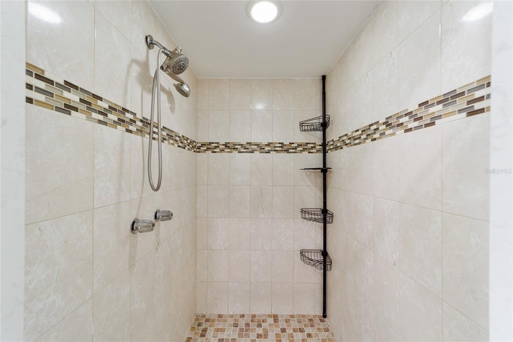 20693 Walnut Street Dunnellon, FL 34431 - Photo 33 of 51 a bathroom with a shower