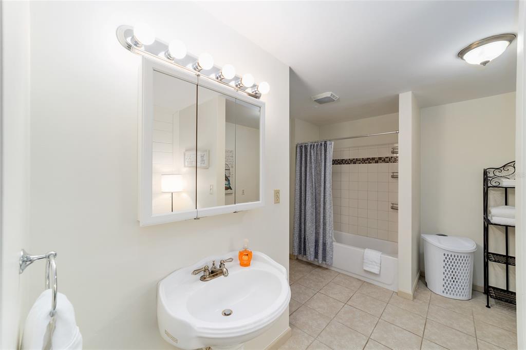 20693 Walnut Street Dunnellon, FL 34431 - Photo 35 of 51 a bathroom with a sink a toilet and shower