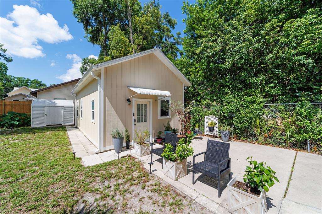 20693 Walnut Street Dunnellon, FL 34431 - Photo 39 of 51 a view of a house with backyard and sitting area