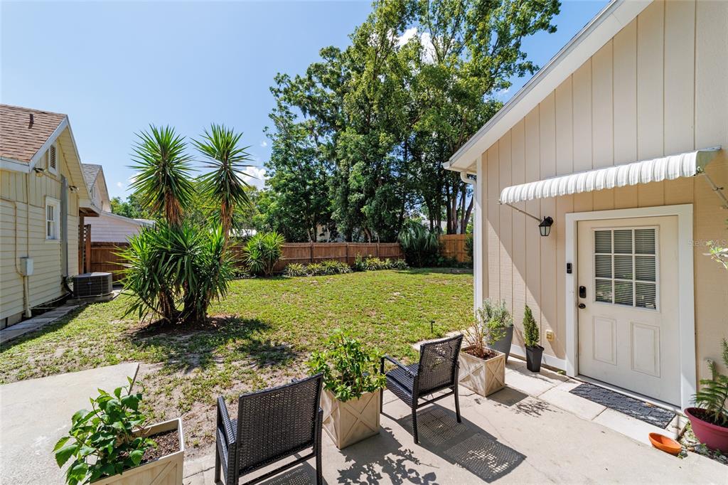 20693 Walnut Street Dunnellon, FL 34431 - Photo 41 of 51 a view of a house with backyard and sitting area