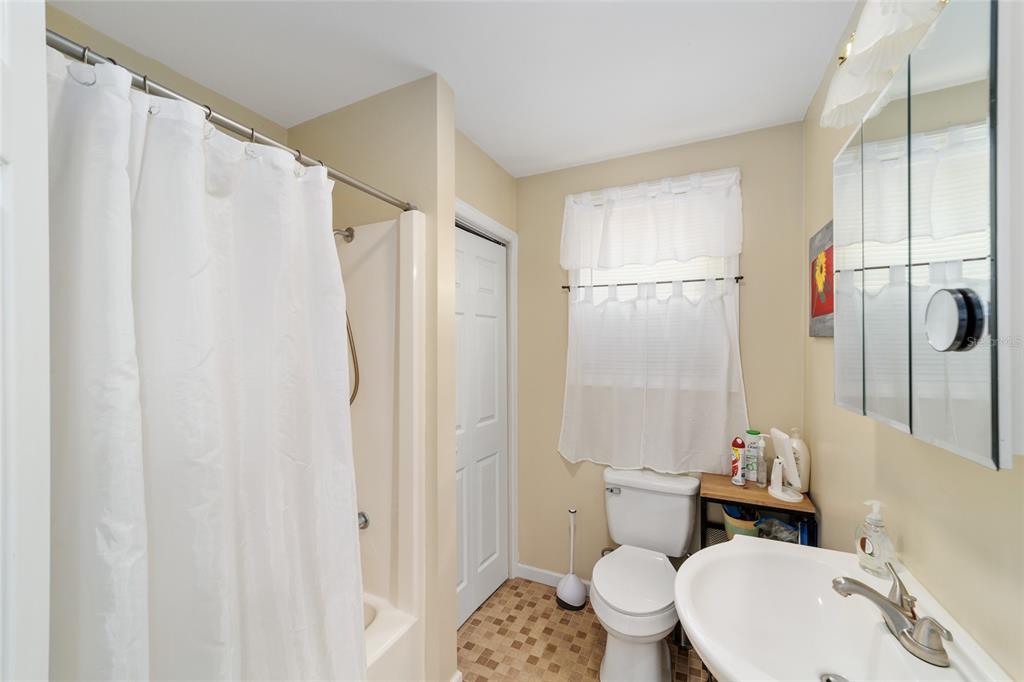 20693 Walnut Street Dunnellon, FL 34431 - Photo 45 of 51 a bathroom with a sink toilet and shower