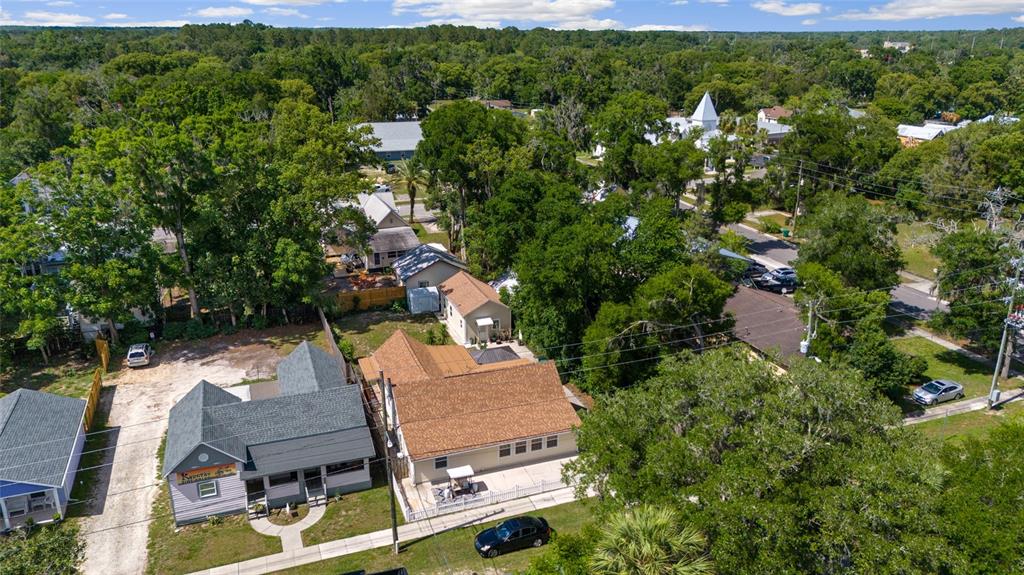 20693 Walnut Street Dunnellon, FL 34431 - Photo 47 of 51 an aerial view of a house with a yard basket ball court and outdoor seating
