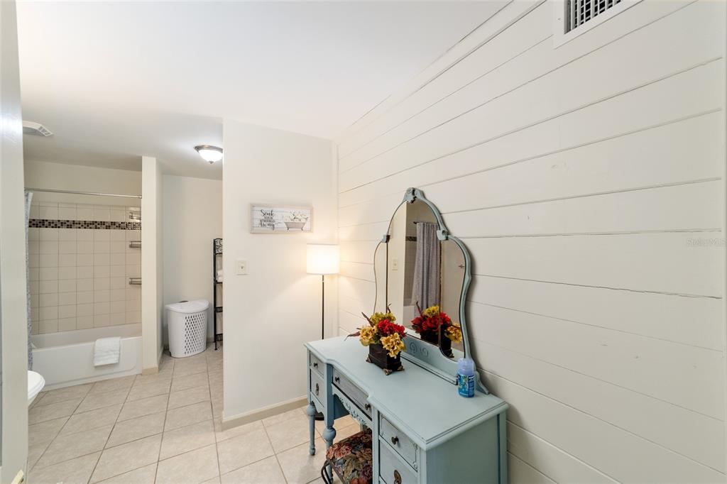 20693 Walnut Street Dunnellon, FL 34431 - Photo 10 of 51 a view of a storage and utility room with furniture and shower