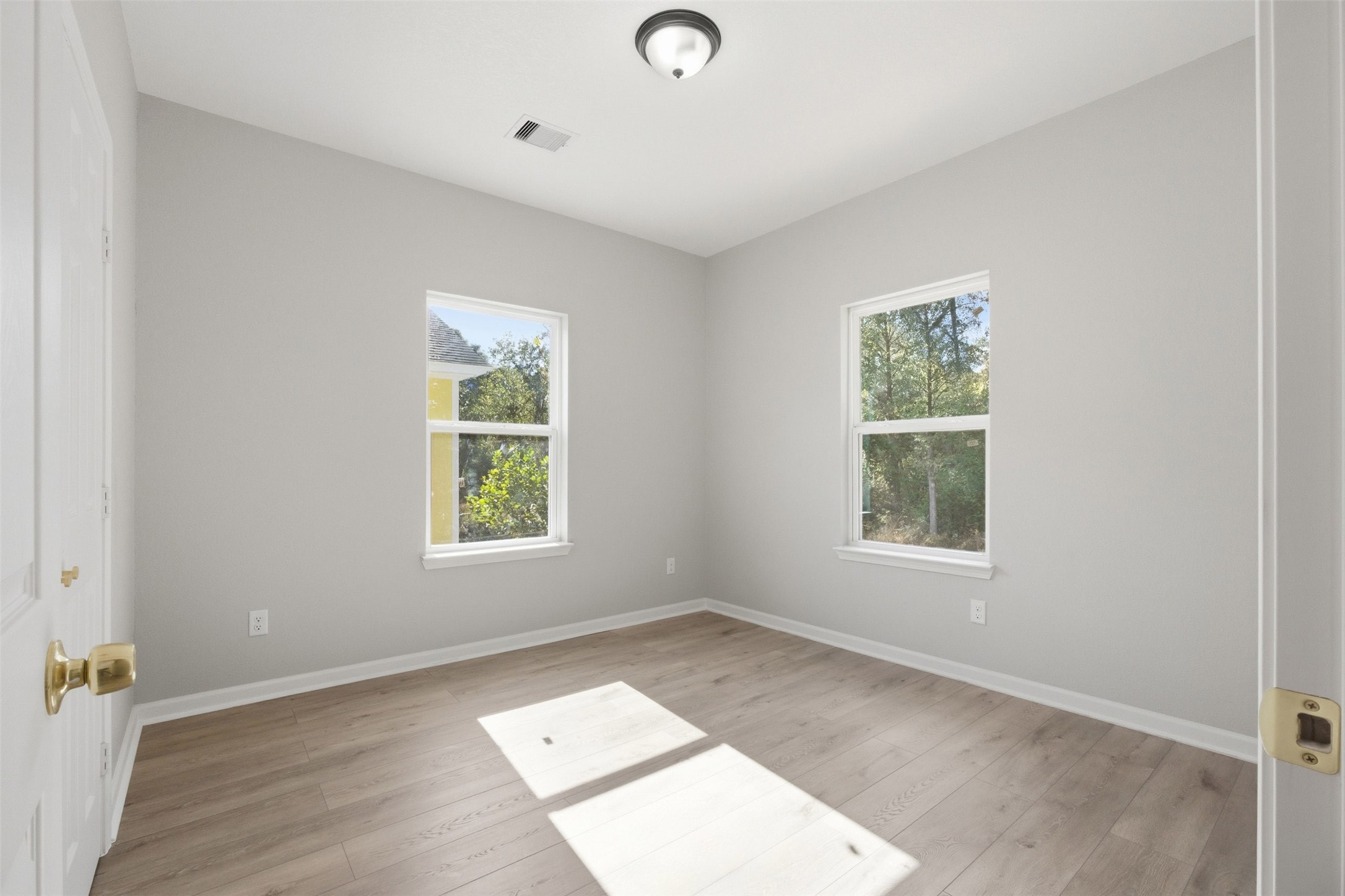 1915 Ross Avenue Cleveland, TX 77327 - Photo 8 of 11 an empty room with a window