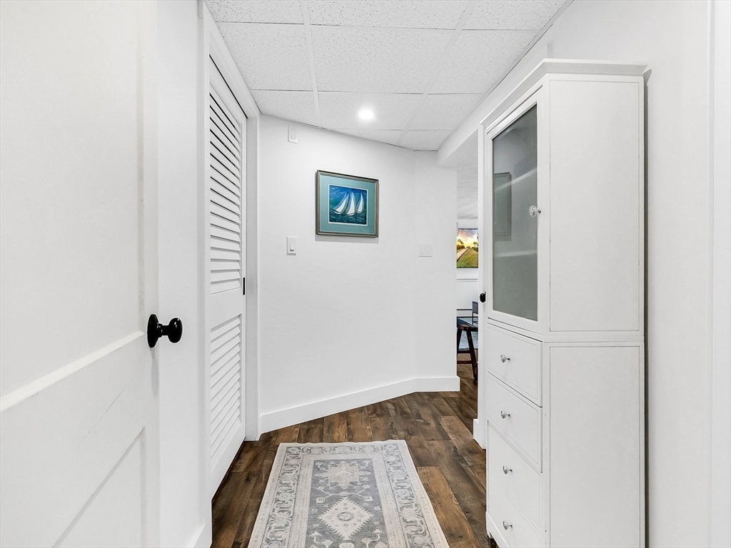 12 Adams Avenue Beverly, MA 01915 - Photo 20 of 31 a view of a hallway with closet and front door