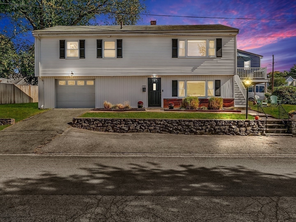 12 Adams Avenue Beverly, MA 01915 - Photo 25 of 31 a front view of a house with a yard