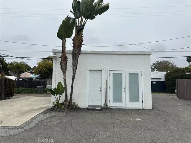 a potted plant sitting in front of a building