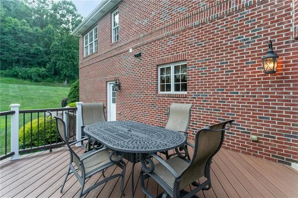 a view of a deck with furniture