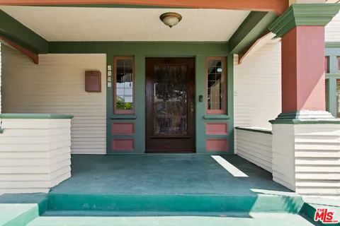 a front view of a house with a porch