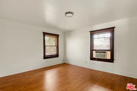 a view of a room that has a window in it