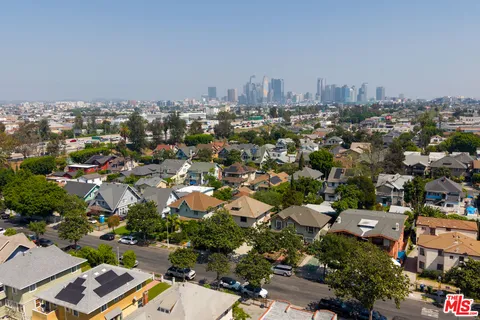 an aerial view of a city with lots of residential buildings