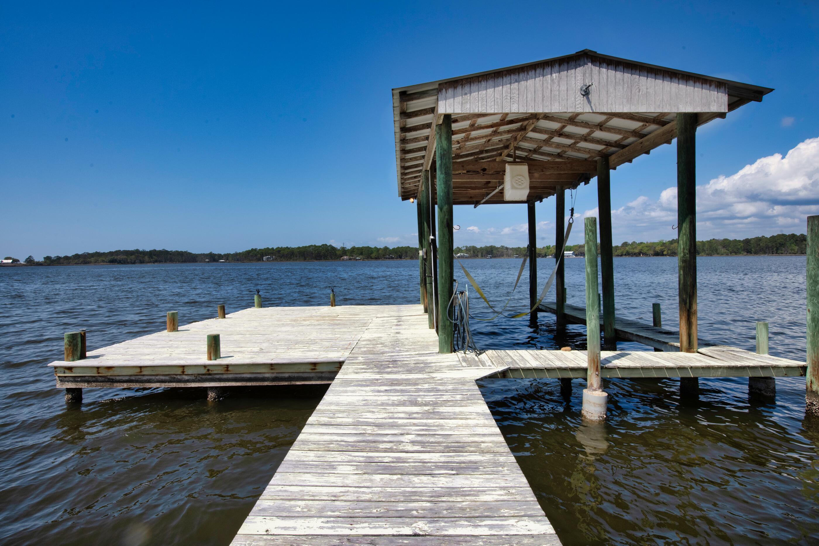 1422 Lagrange Road Freeport, FL 32439 - Photo 77 of 97 covered boat dock with 5000 lb boat lift