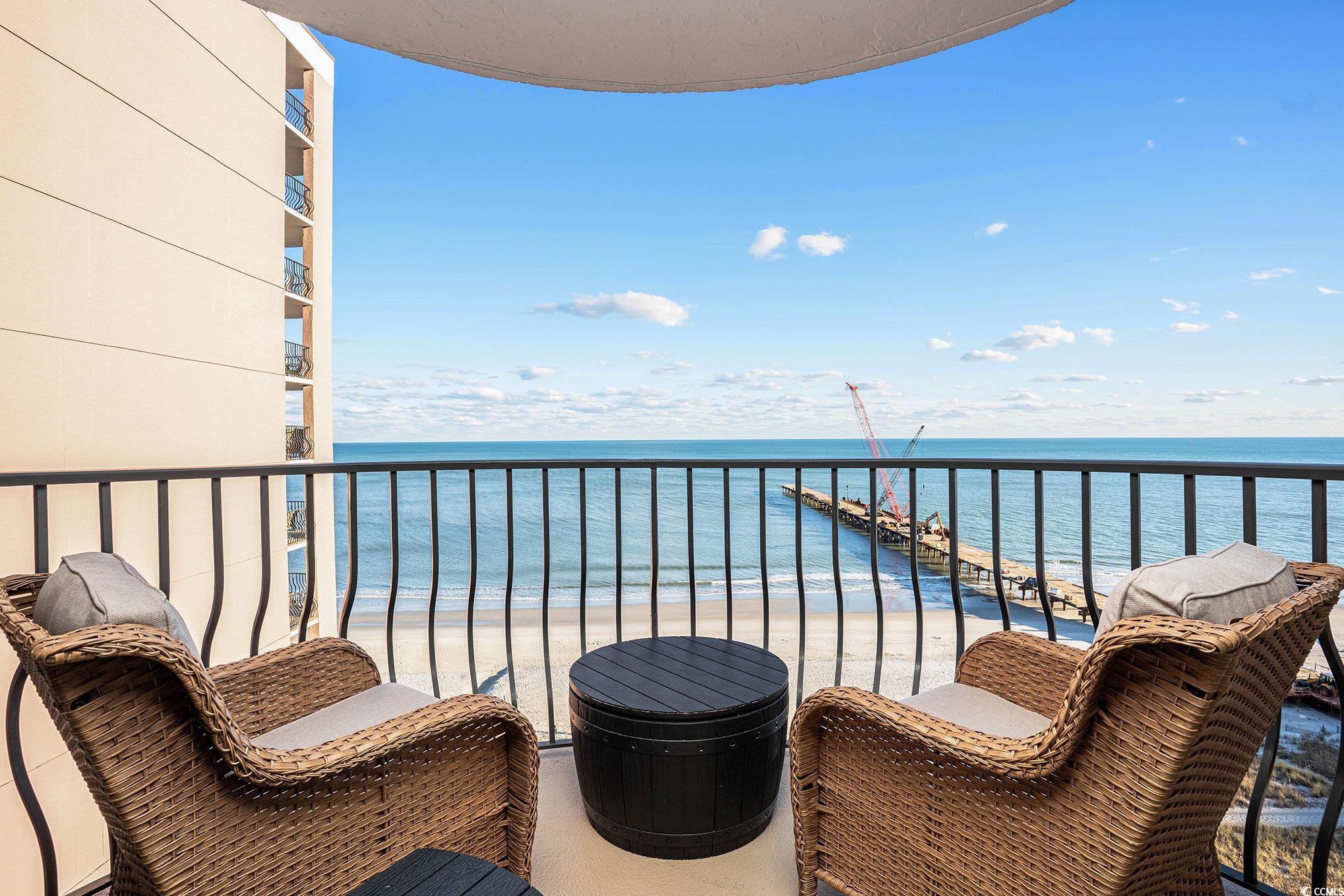 2406 North Ocean Boulevard, Unit 1203 Myrtle Beach, SC 29577 - Photo 15 of 24 Balcony featuring view of water and beach