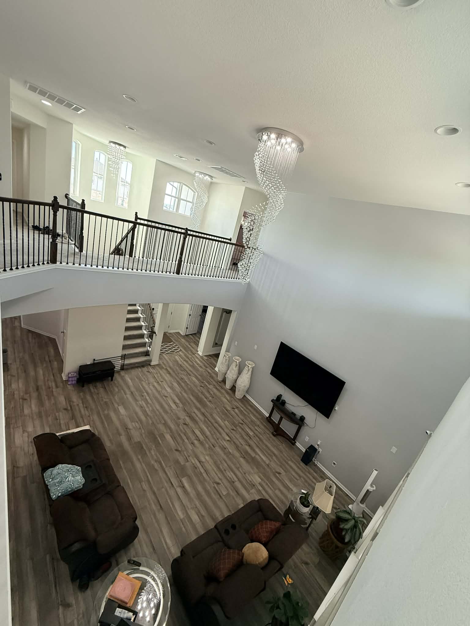 1837 Halflinger Lane Leander, TX 78641 - Photo 18 of 39 Living room with wood finished floors and a high ceiling