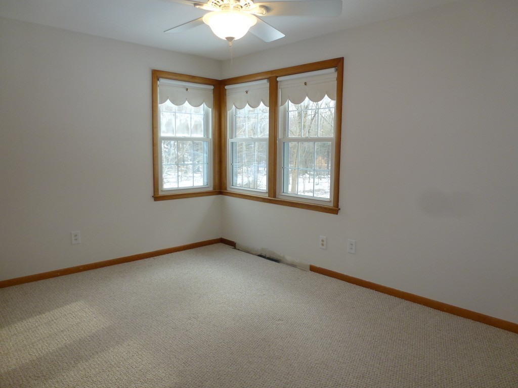 134 Dunstable Road North Chelmsford, MA 01863 - Photo 11 of 26 an empty room with a window