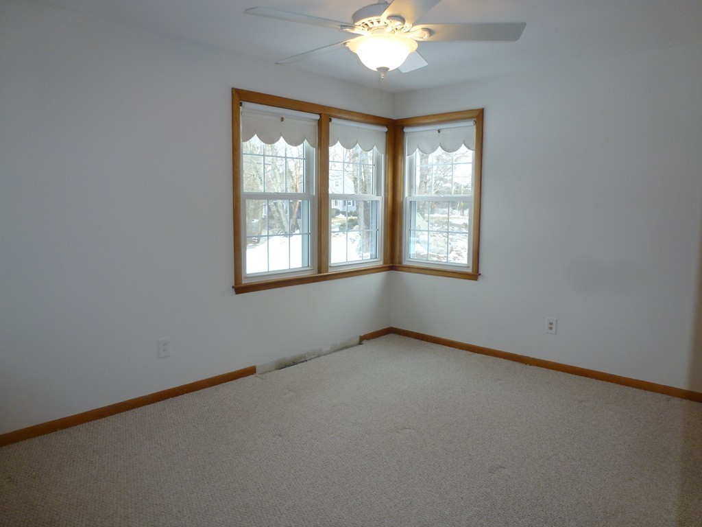134 Dunstable Road North Chelmsford, MA 01863 - Photo 12 of 26 an empty room with a window