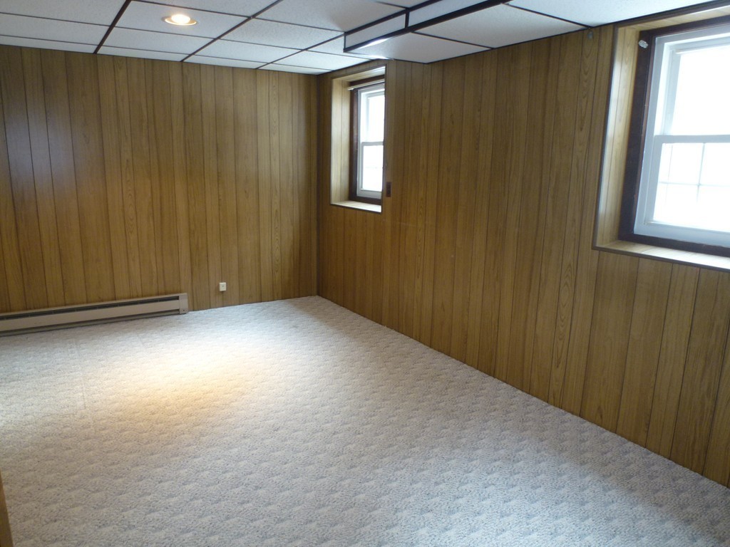 134 Dunstable Road North Chelmsford, MA 01863 - Photo 16 of 26 an empty room with windows