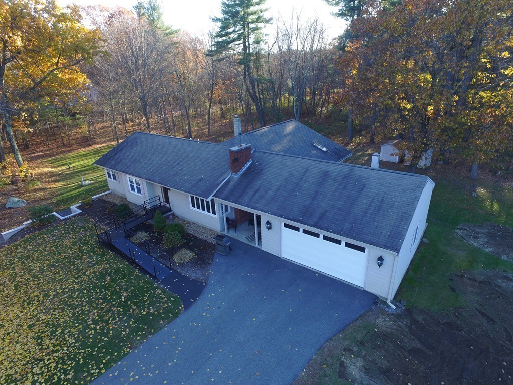 134 Dunstable Road North Chelmsford, MA 01863 - Photo 21 of 26 an aerial view of a house with a yard