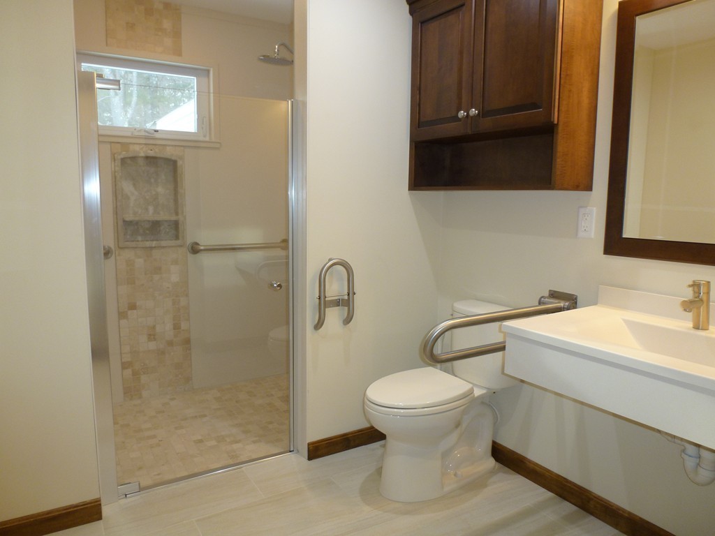 134 Dunstable Road North Chelmsford, MA 01863 - Photo 10 of 26 a bathroom with a toilet sink a shower and vanity