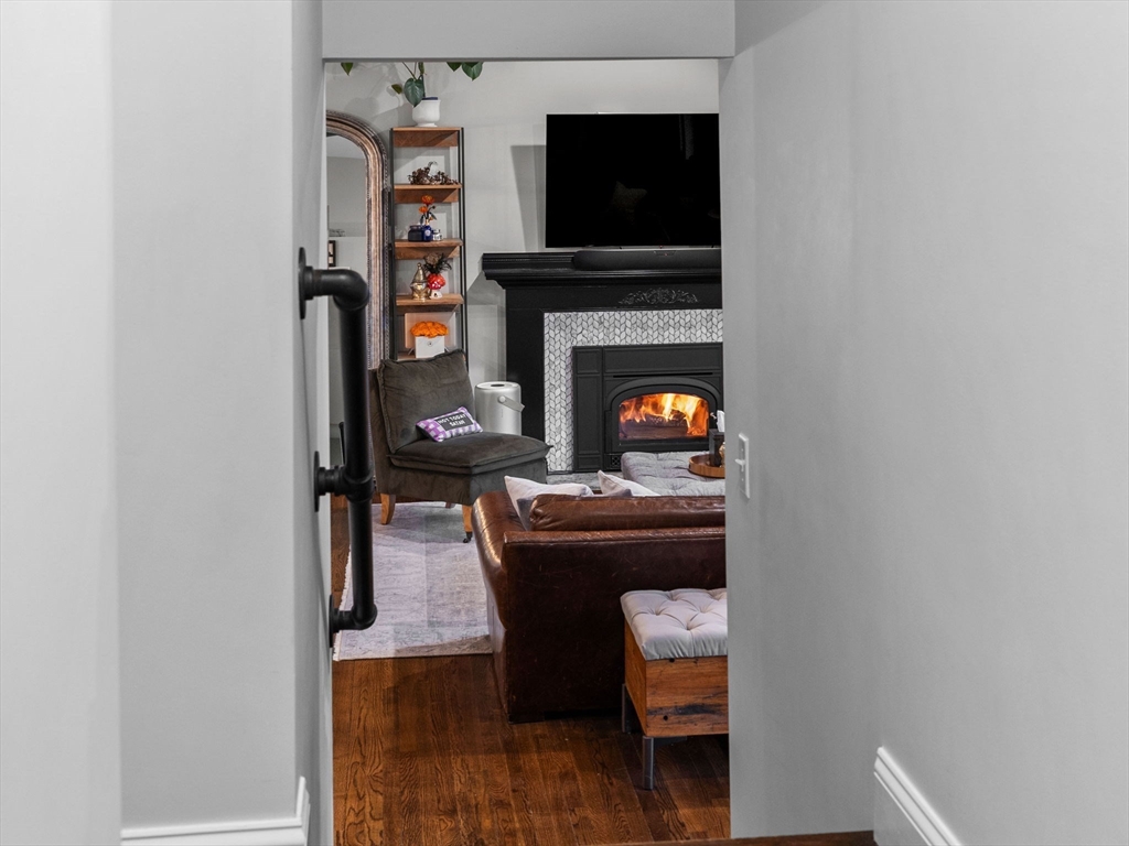 237 York Street Canton, MA 02021 - Photo 15 of 42 a living room with furniture and a fireplace