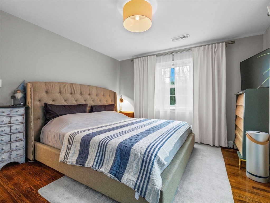 237 York Street Canton, MA 02021 - Photo 17 of 42 a bedroom with a bed and a window