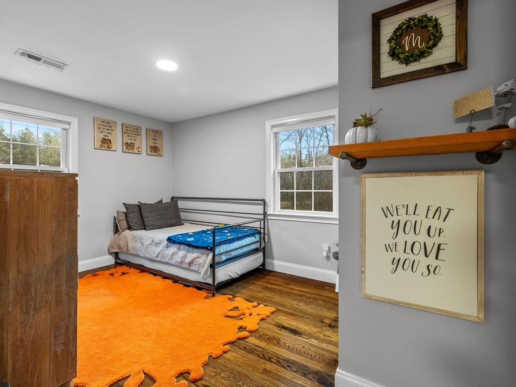 237 York Street Canton, MA 02021 - Photo 19 of 42 a bedroom with furniture and window