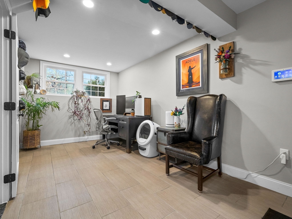 237 York Street Canton, MA 02021 - Photo 24 of 42 a view of a livingroom with workspace and a couch