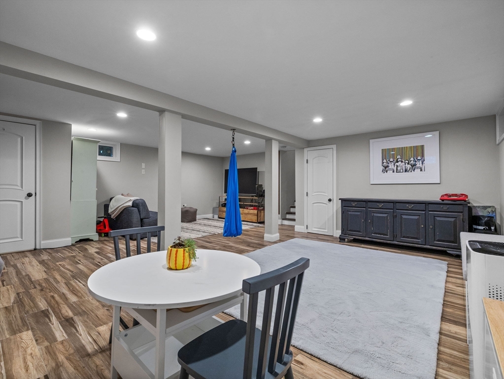 237 York Street Canton, MA 02021 - Photo 28 of 42 a living room with furniture a counter space and a dining room