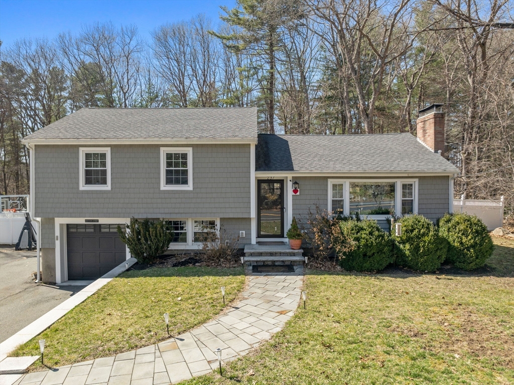 237 York Street Canton, MA 02021 - Photo 33 of 42 a front view of a house with garden